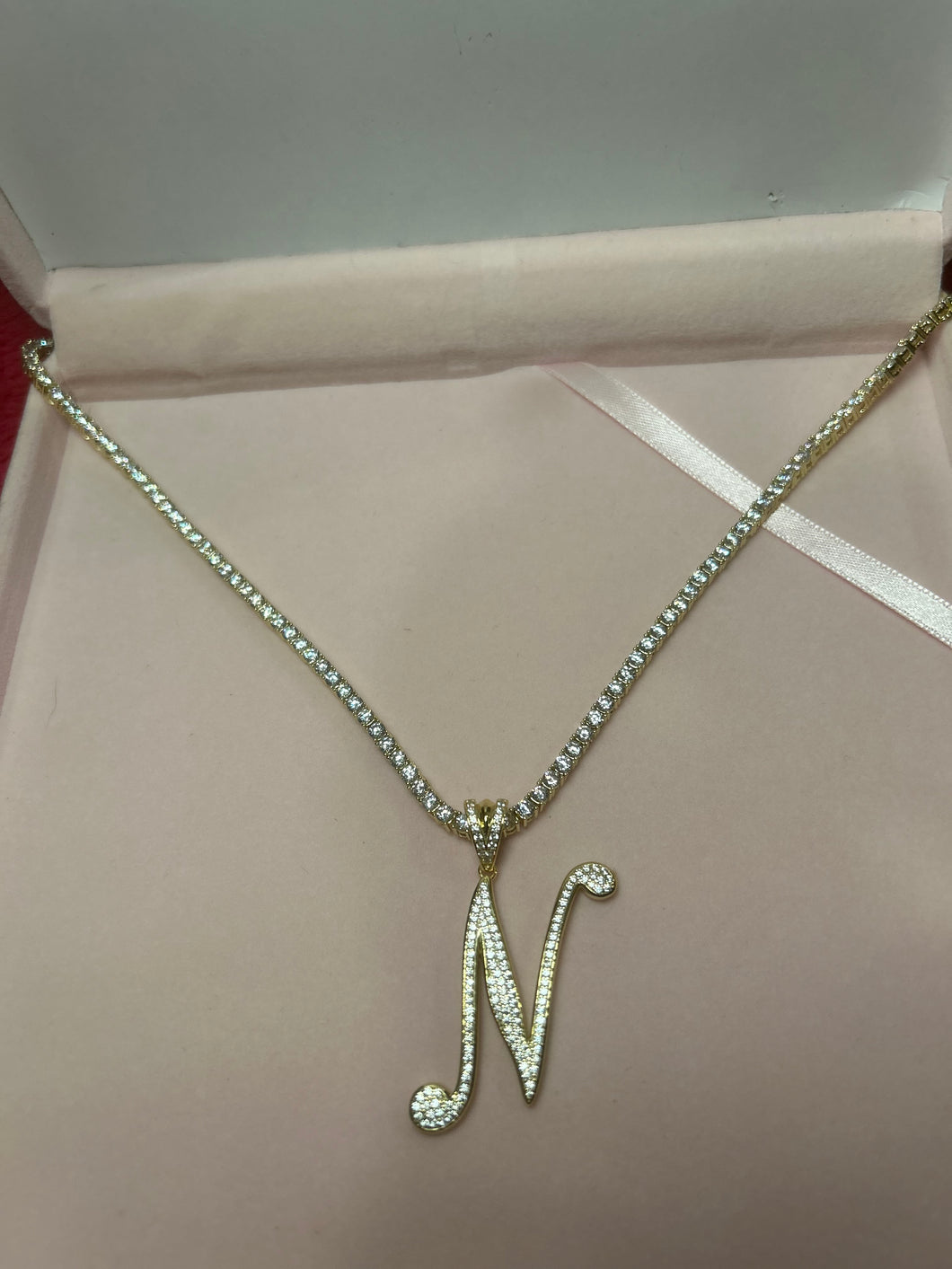 Gold N initial