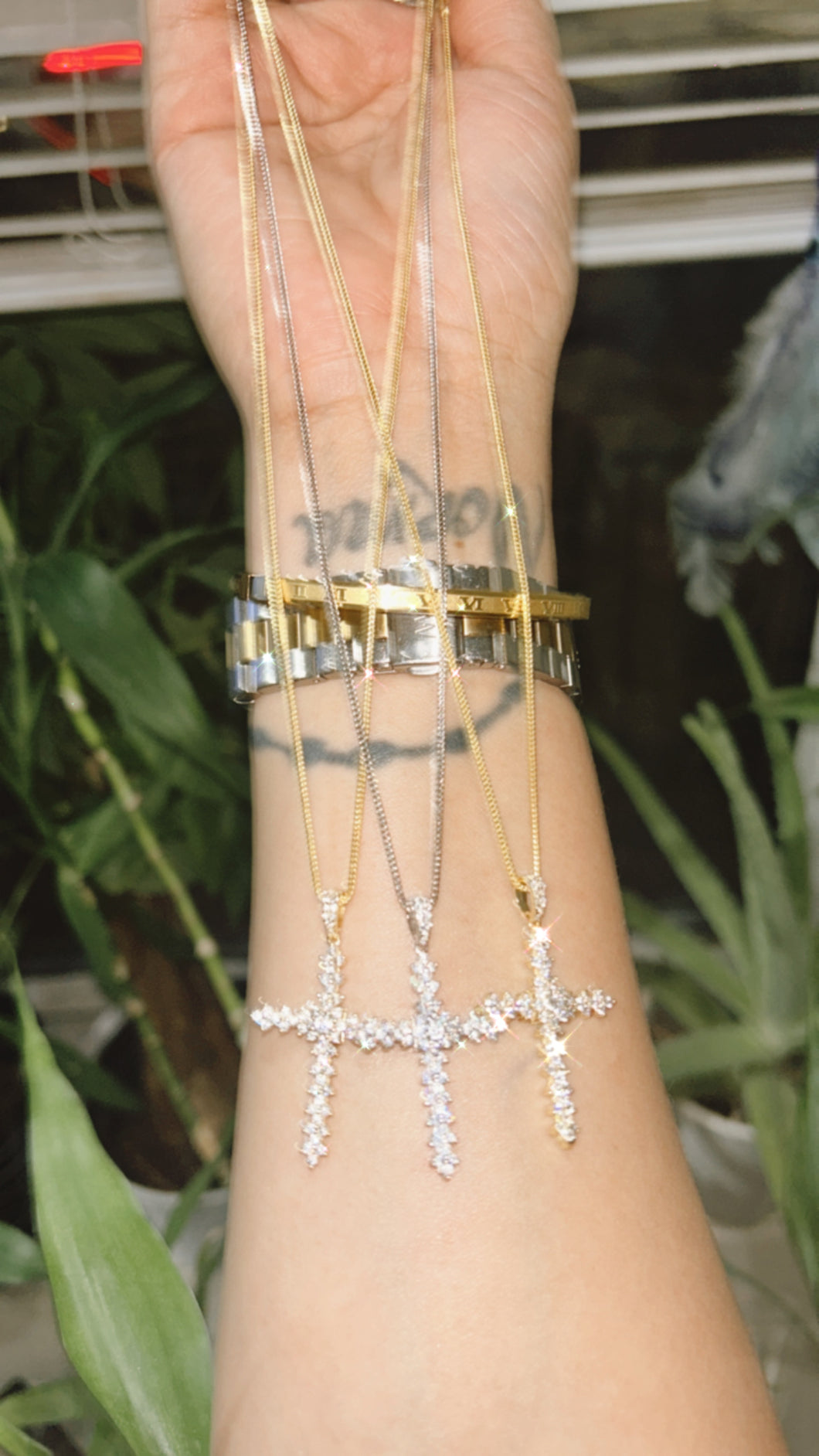 Jaleene cross in gold